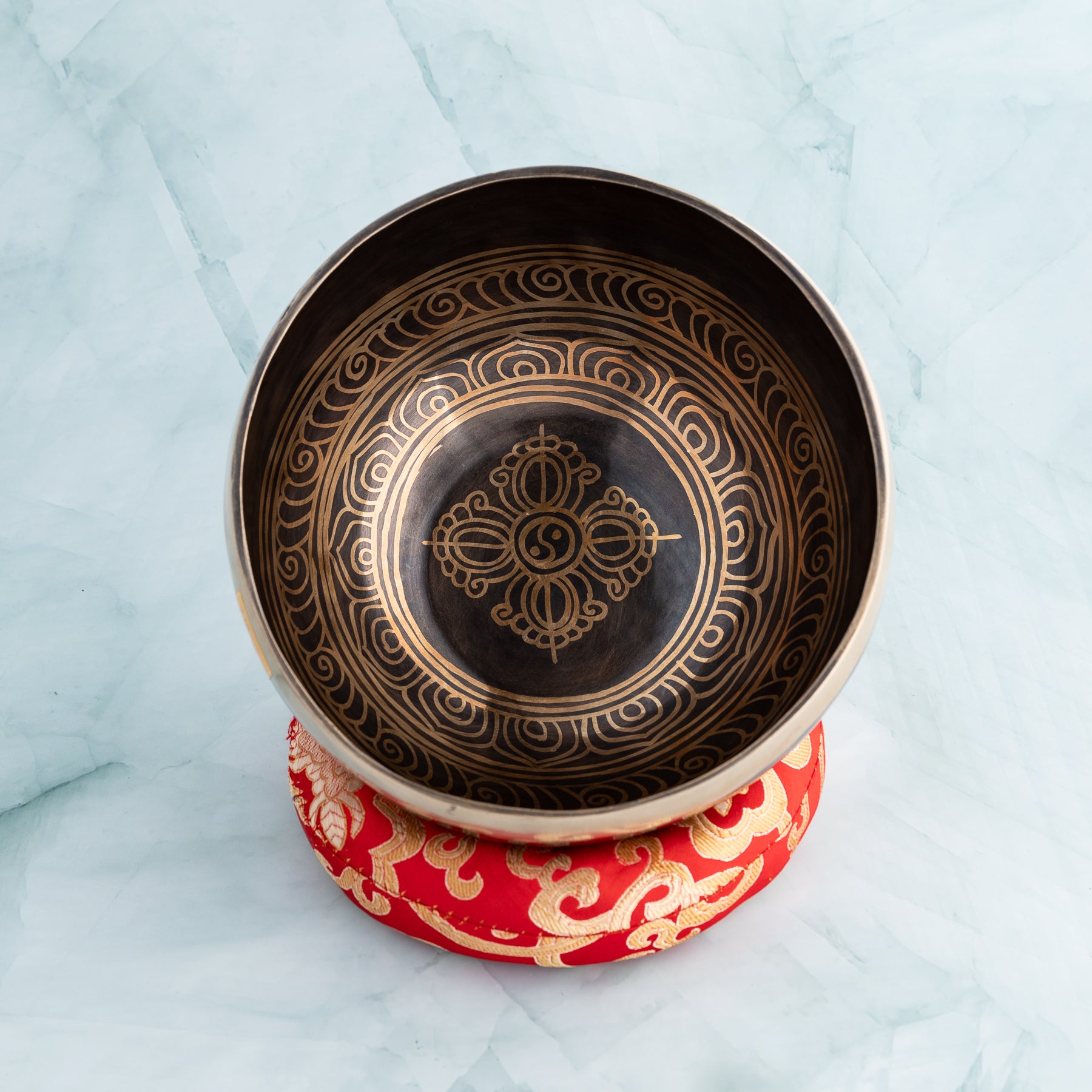 Inside singing bowl, with a cushion