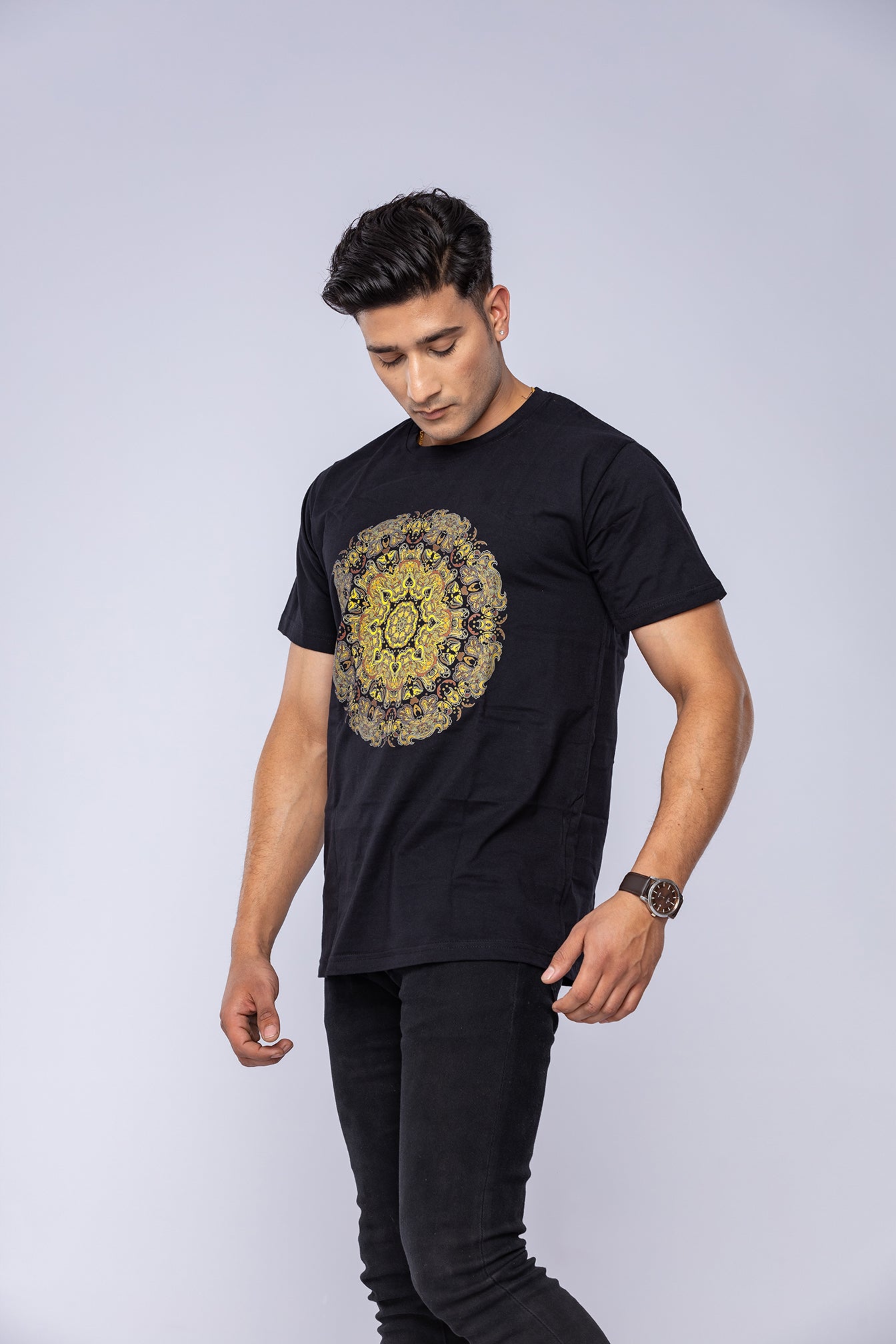 Man wearing black mandala t-shirt