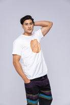 Man wearing white Vajra mandala t-shirt