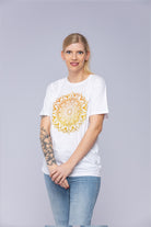 Woman wearing a white mandala t-shirt