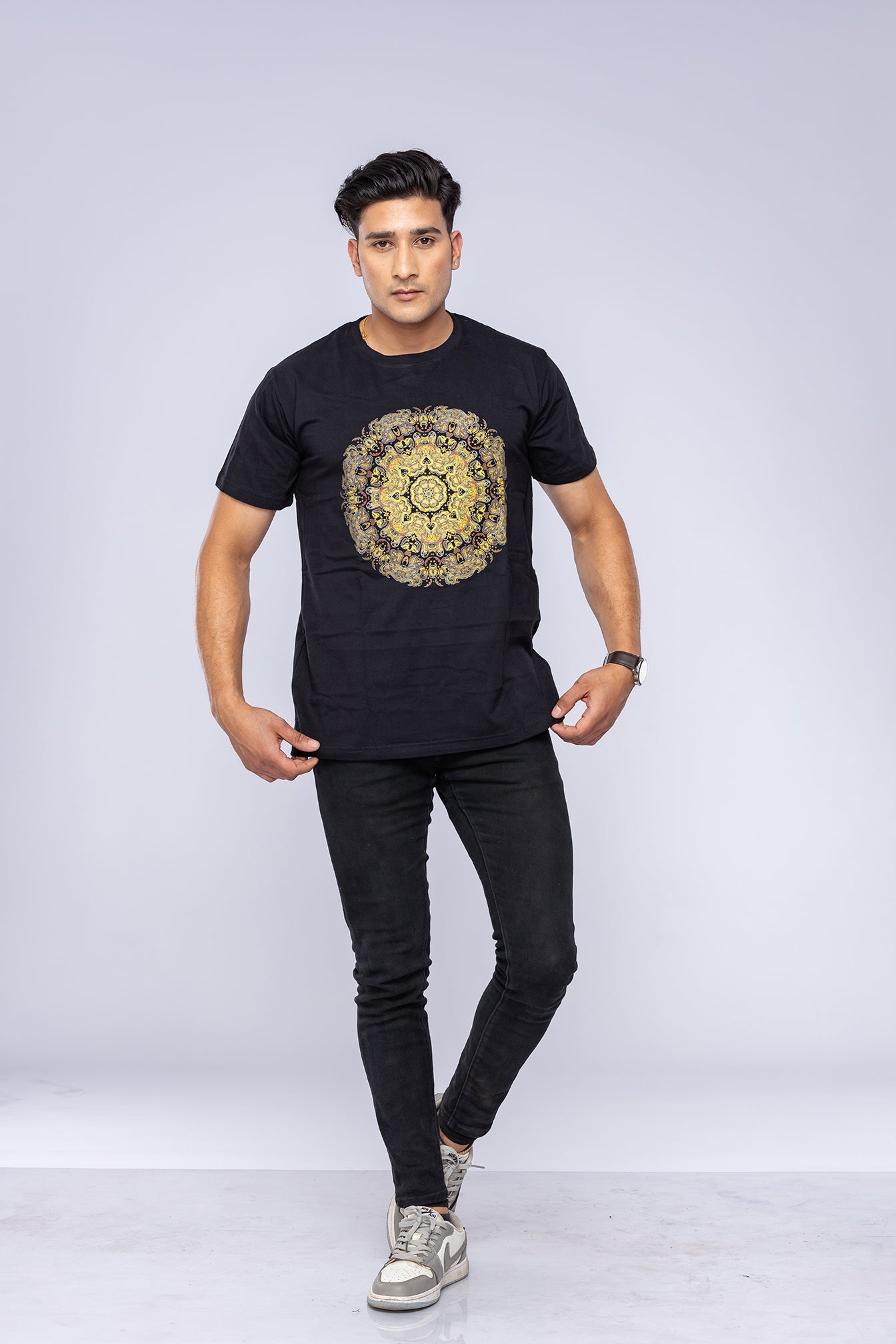 Man wearing black mandala t-shirt