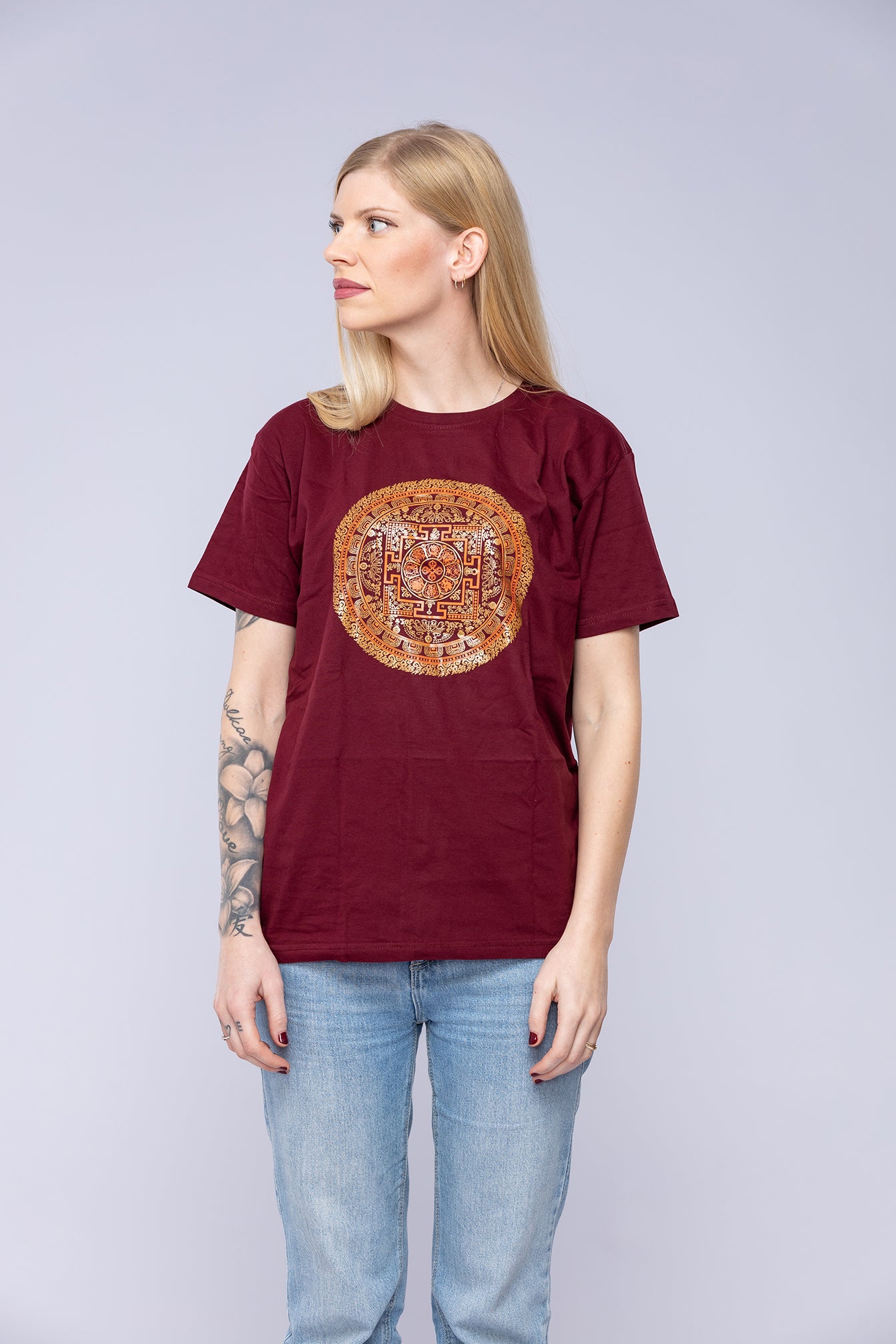 Woman wearing red Vajra mandala t-shirt