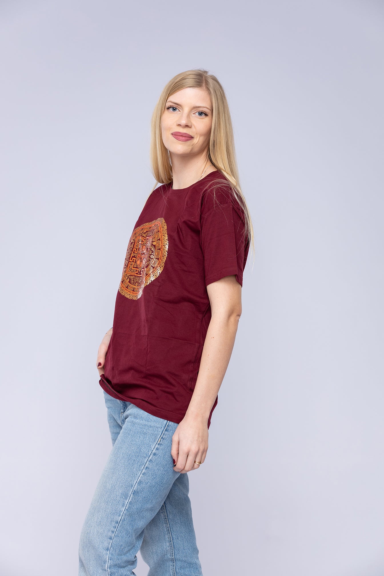 Woman wearing red Vajra mandala t-shirt