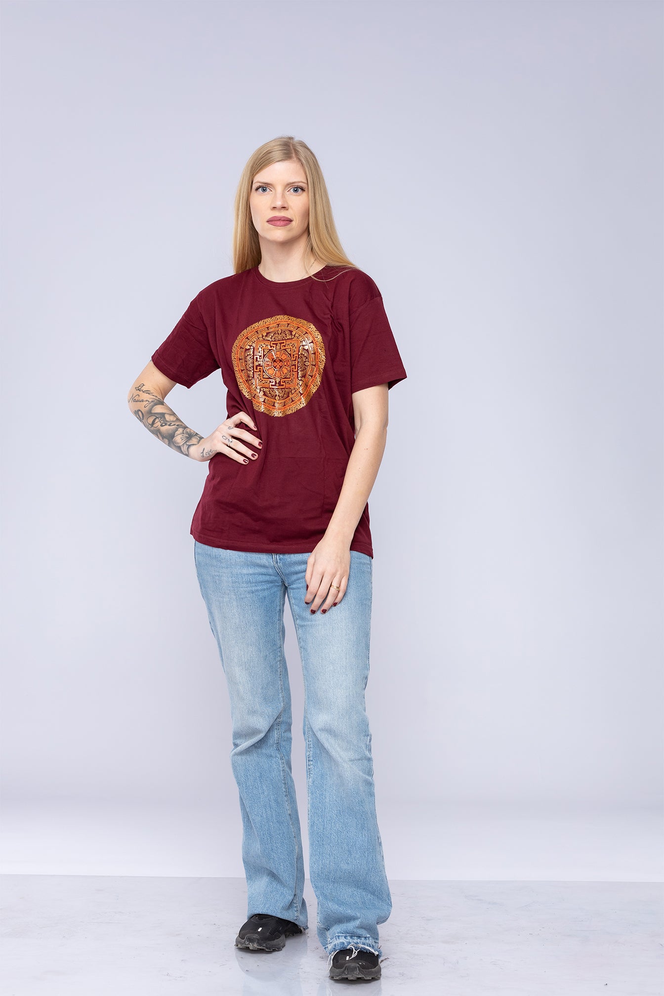 Woman wearing red Vajra mandala t-shirt