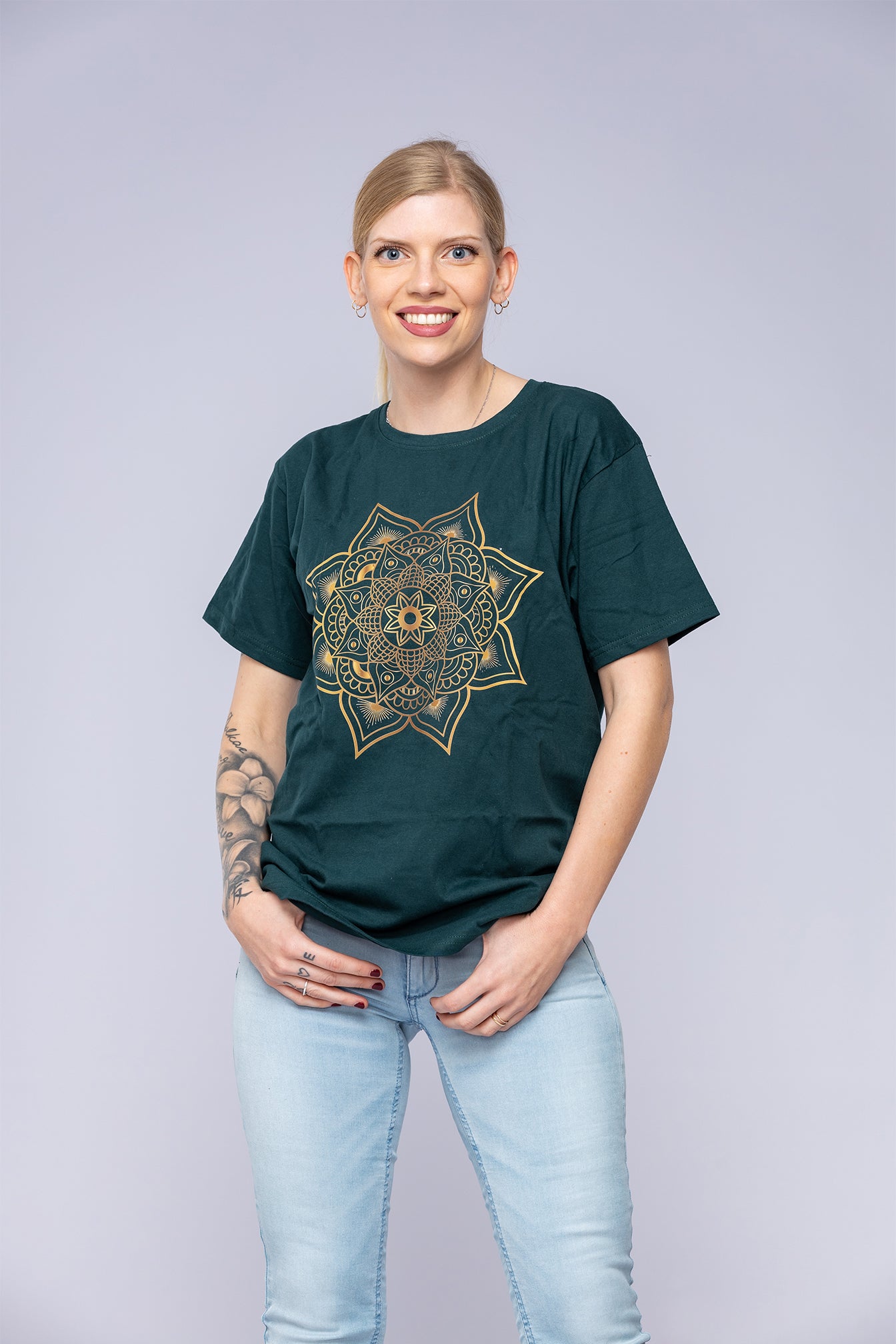 Green mandala t-shirt worn by woman